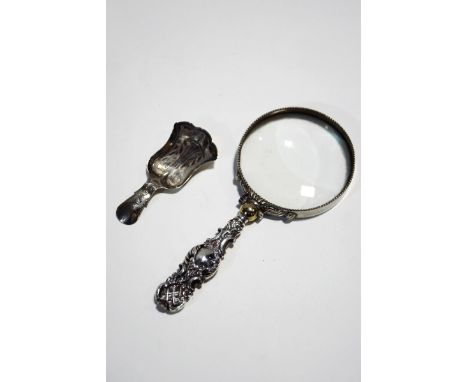 A Georgian silver caddy spoon, by Joseph Taylor, Birmingham 1814, with prick-dot decoration, 7 cm long, 5 g gross; with a sil