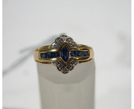 A sapphire and diamond dress ring, stamped '750', finger size K, 2.4 g gross, cased