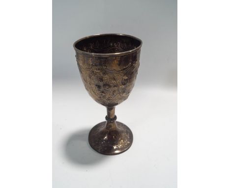 A Victorian silver goblet engraved and embossed with flowers in panels and rocaille, hallmarks for Birmingham 1866 by Thomas 