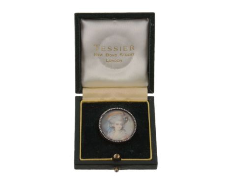  A French mid 19th century miniature portrait brooch, circa 1860, the circular miniature painted with a lady with coiffed hai