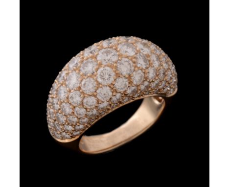 A diamond bombe ring by Van Cleef & Arpels, pave set with brilliant cut diamonds, approximately 4 carats total, to a plain p