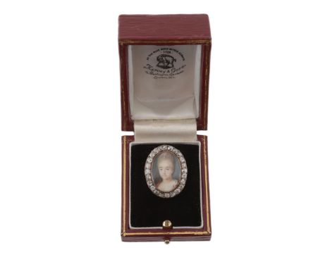  A mid 19th century portrait miniature and diamond ring, circa 1850, the oval panel painted with a lady with intricately plat