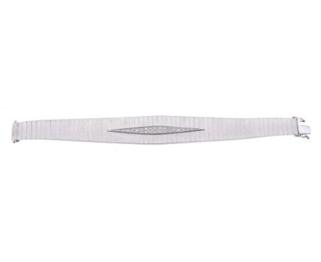  An 18 carat gold diamond bracelet, the tapered articulated bracelet with brushed detail throughout, set to the centre with a
