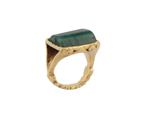 A Roman gold and emerald single stone ring , circa 3rd-4th century AD, the rectangular shaped emerald collet set within a scr