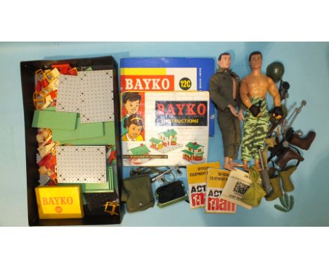 A Hasbro Action Man c1964, another, 1992, a quantity of Action Man equipment, booklets, etc. and a quantity of Bayko construc