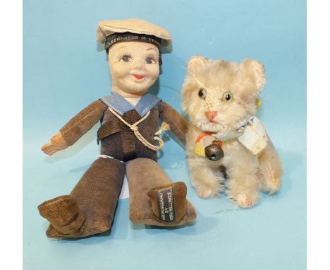 A Steiff 'Susi' kitten with glass eyes and stripy plush, label with button and paper label with bell, 10cm and a Norah Wellin