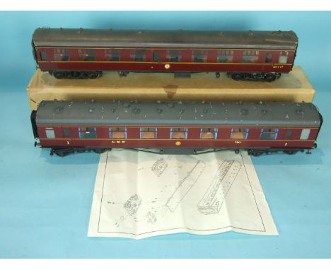 O gauge, two kit models of coaches, BR maroon GE4545, (a/f) and LMS maroon 7511 Buffet Car, both boxed, marked 'Made in China