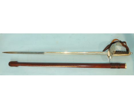 A George VI officer's sword by Wilkinson Sword, marked for John Jones & Co, Bristol, the pierced basket hilt with bound fish 