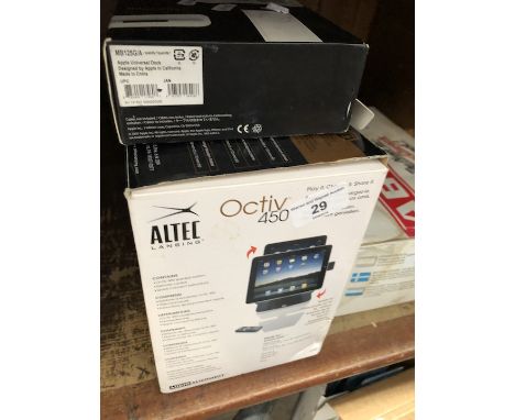 A Altec Octiv 450 speaker and charging dock, a universal dock and a universal remote 