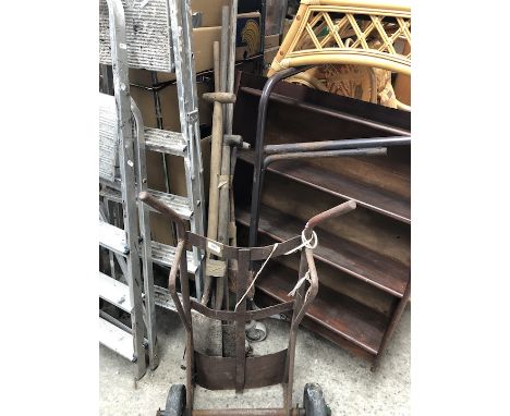 An old sack truck and 2 bundles of garden tools 