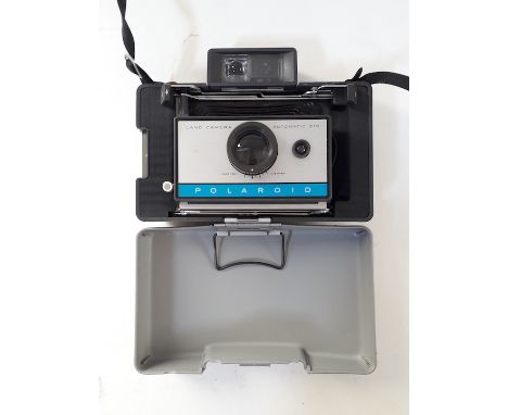 A Polaroid 210 Automatic Land Camera. 