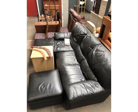 A black leather DFS corner sofa with cleaning kit 