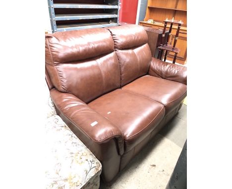 A brown leather sofa 