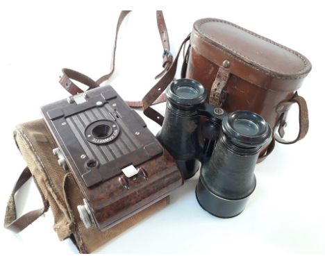 A Kodak Hawkette bellows camera and a pair of field binoculars in leather case. 