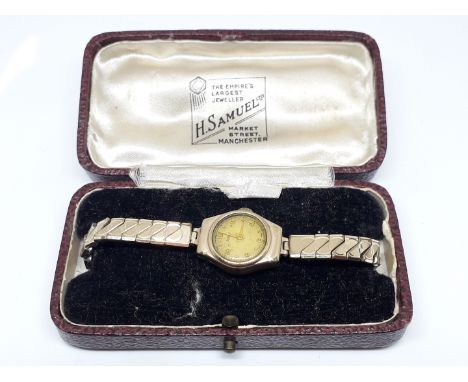 A 9ct gold Rotary wristwatch with gold plated sprung strap. 