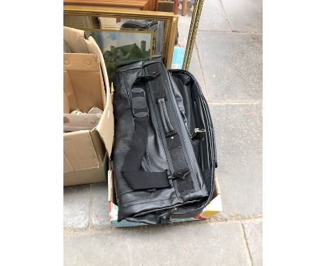 A box of tools and a holdall 