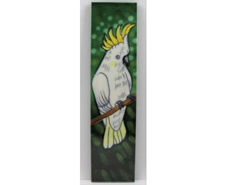 A LATE 20TH CENTURY WALL PANEL, tube lined and hand painted decoration of a sulphur-crested cockatoo, monogrammed 'TC', 39.5c