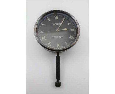 A MID 20TH CENTURY 'BRITISH JAEGER' AUTOMOBILE CLOCK, ebonised dial with Roman numerals, inscribed 'British Jaeger', 'Chronos