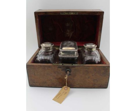 A SET OF THREE MID 18TH CENTURY SILVER LIDDED FACET CUT GLASS TEA CADDIES, the central box form, the cover engraved with full