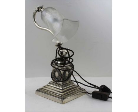 A SILVER PLATED ADJUSTABLE TABLE LAMP, classical plinth stem with wreath decoration on square stepped base, fitted an opaque 