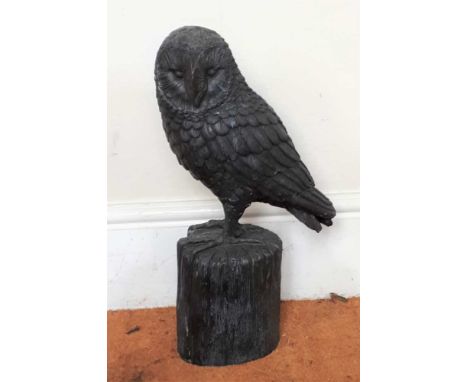 A WELL CAST METAL MODEL OF A LIFE SIZE OWL, on tree trunk plinth, 55cm high 