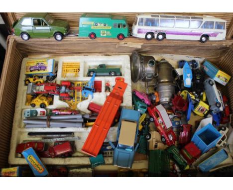 A SUITCASE OF ASSORTED DIE-CAST VEHICLES, to include; a coach, a fire engine, a tractor, etc. 