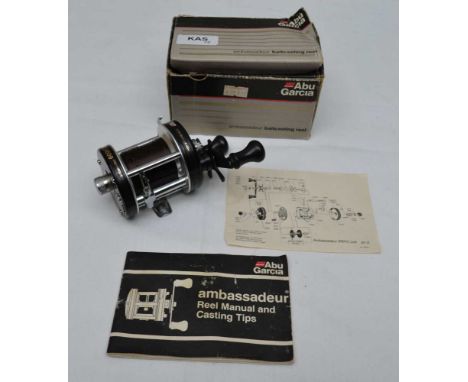 ABU GARCIA, THE AMBASSADOR 6001C BAITCASTING REEL in original box with manual and casting tips in unused condition 