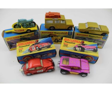 A MATCHBOX SUPERFAST 12 SAFARI LAND ROVER, in original box and four other Matchbox vehicles, boxed (5)Condition report – Orig