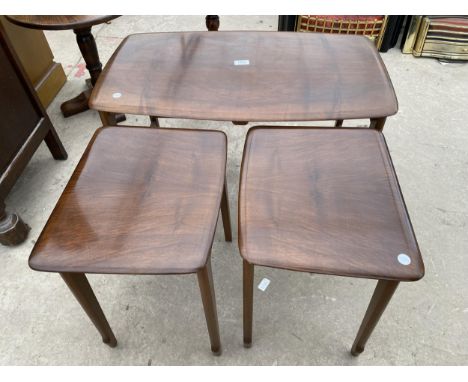 A NEST OF THREE ERCOL STYLE TABLES 