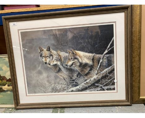 A LARGE FRAMED LIMITED EDITION PRINT DEPEICTING THREE WOLVES IN A WINTER FOREST SCENE SIGNED BY LYNDSEY SELLEY W: 90CM 