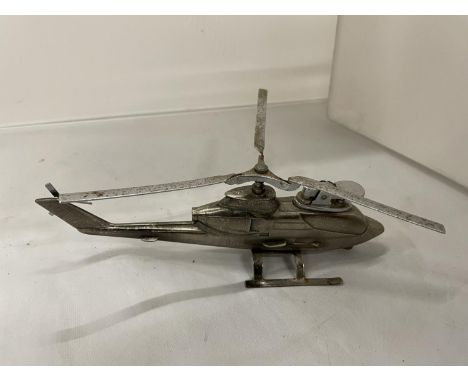 A RARE 1967 RETRO JAPANESE PLATED HUEY COBRA CIGARETTE LIGHTER IN THE FORM OF A HELICOPTER 