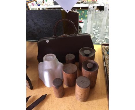 A QUANTITY OF VINTAGE WOODEN PORK PIE MOULDS, A JELLY MOULD AND A LEATHER GLADSTONE BAG 