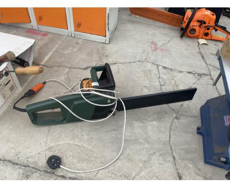 AN ELECTRIC BLACK AND DECKER CHAINSAW 