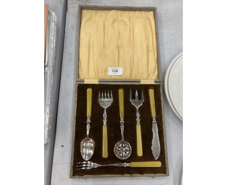 A SILVER PLATED BUTTERSCOTCH COLOURED HANDLED CAKE SET WITH SUGAR SIFTER SPOON, FORKS KNIFE, ETC 