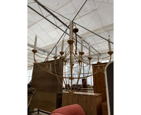A LARGE GILT METAL CHANDELIER LIGHT FITTING 