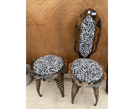 A VINTAGE WROUGHT IRON CHAIR AND A STOOL WITH UPHOLSTERED SEATS 