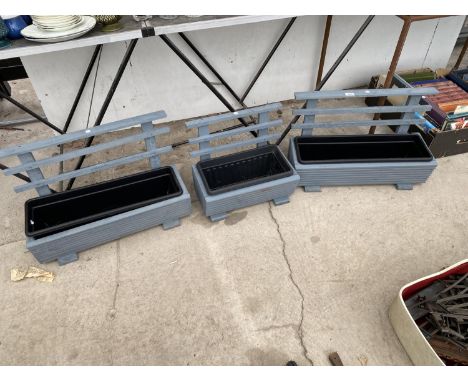 THREE WOODEN TROUGH PLANTERS WITH PLASTIC INSERTS 