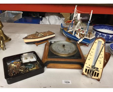 A MODEL OF A TRAWLER ON A STAND LENGTH APPROX 30CM, SPEEDBOAT MODEL, BAROMETER, METRONOME, ETC 