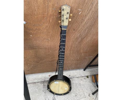 A VINTAGE BANJO 