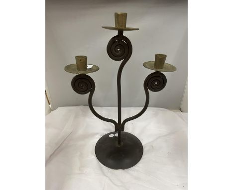 A THREE STEMMED METAL CANDLESTICK HEIGHT 41CM 