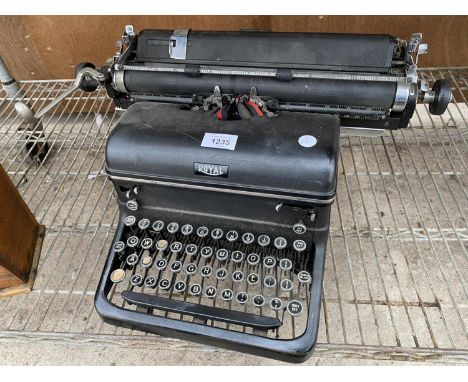 A VINTAGE AND RETRO ROYAL TYPEWRITER 