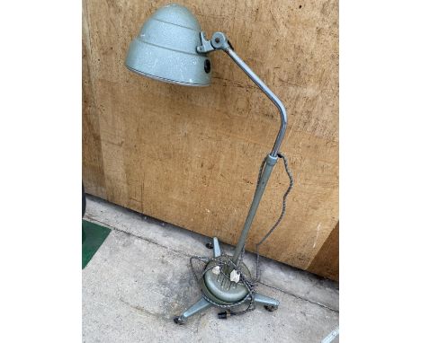 A RETRO INDUSTRIAL STYLE LIGHT ON WHEELED BASE 