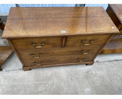 A GEORGE III STYLE LIGHT OAK CHEST OF TWO SHORT AND TWO LONG PARTITIONED DRAWERS, ON BRACKET FEET, 38" WIDE 