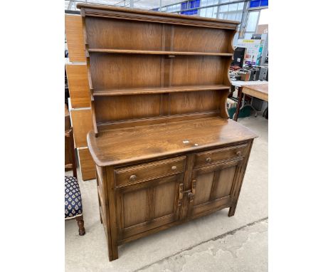 AN ELM ERCOL DRESSER COMPLETE WITH PLATE RACK, 48" WIDE 