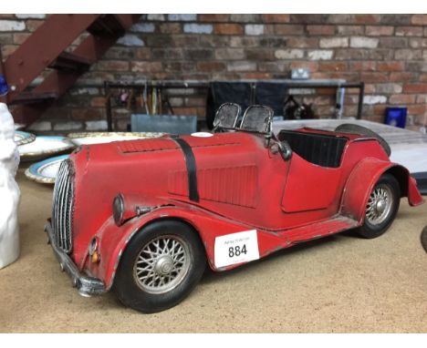 A LARGE MODEL OF A RED MORGAN SPORTS CAR LENGTH 36CM 