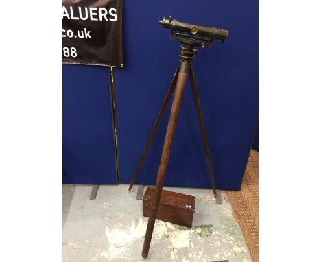 A THEODOLITE AND STAND 