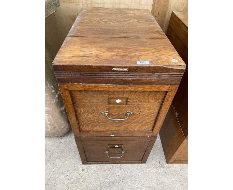 A VINTAGE WOODEN TWO DRAWER INTERLOCKING FILING CABINET 