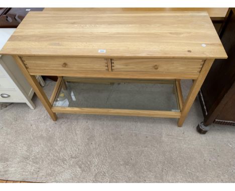 A JOHN LEWIS OAK TWO DRAWER SIDE-TABLE WITH OPEN BASE HAVING GLASS SHELF, 47.5" WIDE 