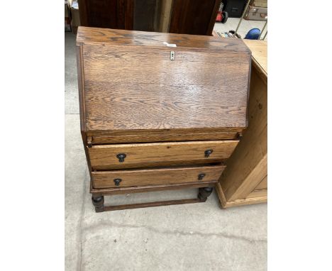 AN EARLY 20TH CENTURY OAK BUREAU, 28.5" WIDE AND A VICTORIAN BOX COMMODE 