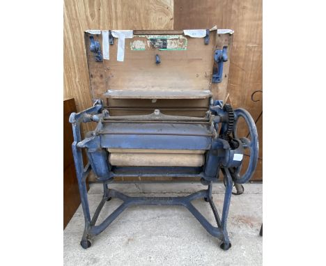 A VINTAGE CAST IRON EWBANK MANGLE IN WORKING CONDITION 